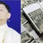 अहमदाबाद क्राइम ब्रांच द्वारा गिरफ्तार प्रदीप गुरुजी और जब्त किए गए नकली नोटों का जखीरा।