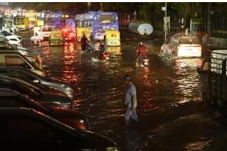 Bengaluru rain flooding roads lake encroachment urban infrastructure crisis India