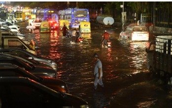 Bengaluru rain flooding roads lake encroachment urban infrastructure crisis India